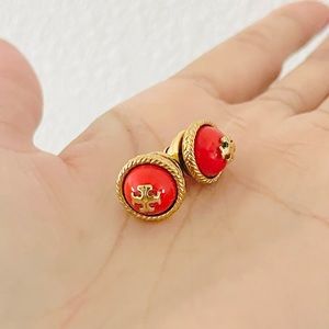 Authentic Tory Burch stud earring